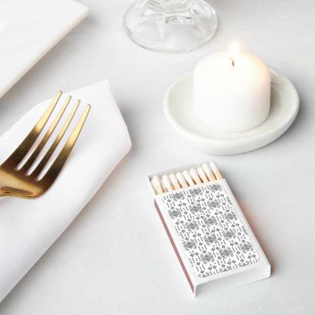 a black and white pattern with a white background matchboxes (Insitu)