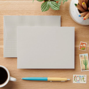 a black and white photo of a man in a suit and tie envelope