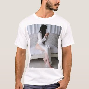 A Black-Haired Woman Wearing a Blue Pheasant Drink T-Shirt