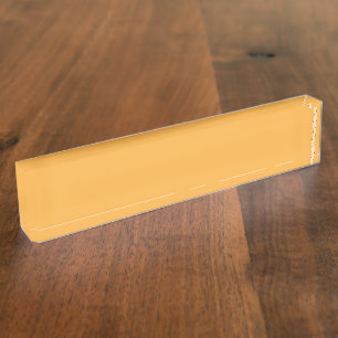 A blend of yellow and orange hues creates a vibran desk name plate