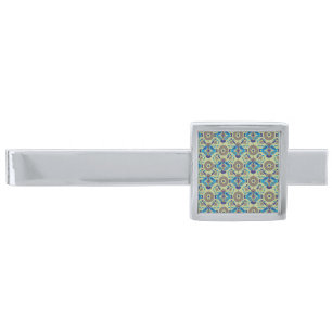 a blue and green pattern on a green background silver finish tie bar