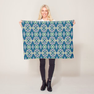 a blue and green pattern with a white background fleece blanket