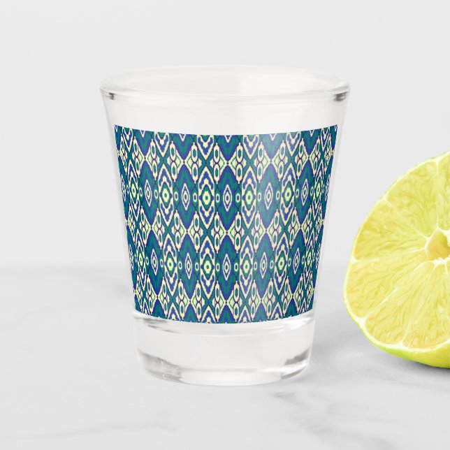 a blue and green pattern with a white background shot glass (Front)