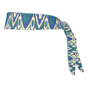 a blue and green pattern with a white background tie headband