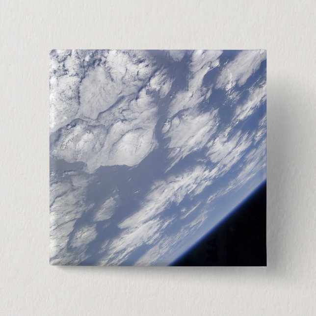 A blue and white part of Earth Button (Front)