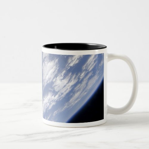 A blue and white part of Earth Two_Tone Coffee Mug