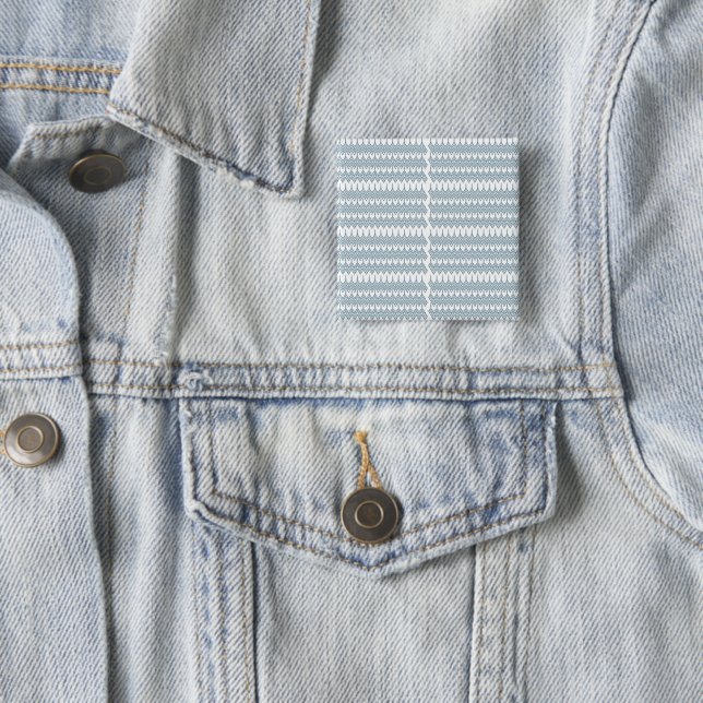 a blue and white pattern with a white background button (In Situ)