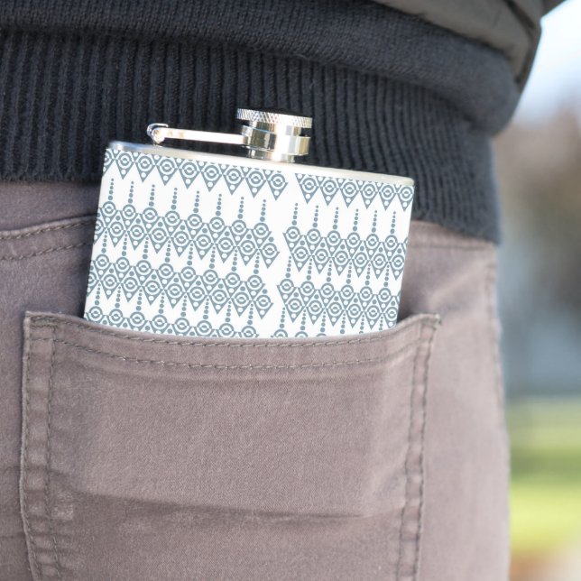a blue and white pattern with a white background flask (In Situ)