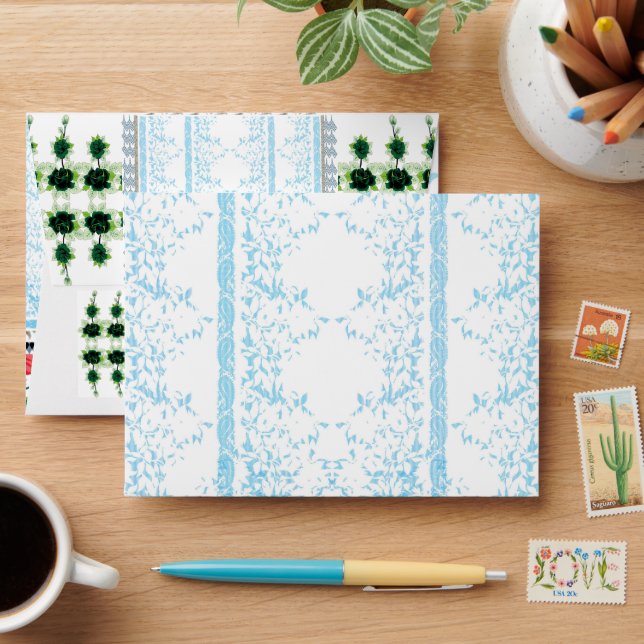 a blue and white striped background with leaves envelope (Desk)