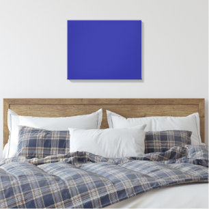 A blue background featuring a prominent white squa canvas print