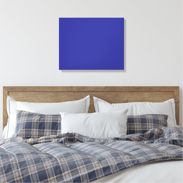 A blue background featuring a prominent white squa canvas print (Insitu(Bedroom))