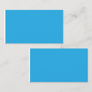 a blue background with a black and white cat calling card