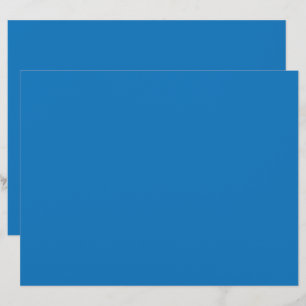a blue background with a black and white clock letterhead