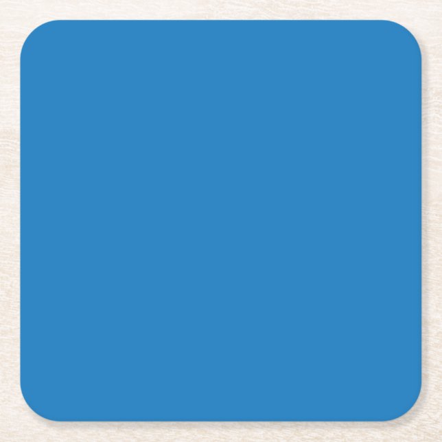 a blue background with a black and white clock square paper coaster (Front)