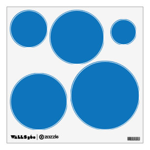 a blue background with a black and white clock wall decal