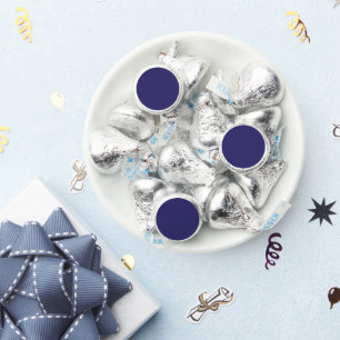 a blue background with a clock on it hershey®'s kisses®
