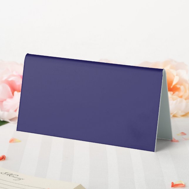 a blue background with a clock on it table tent (In SItu (Wedding))