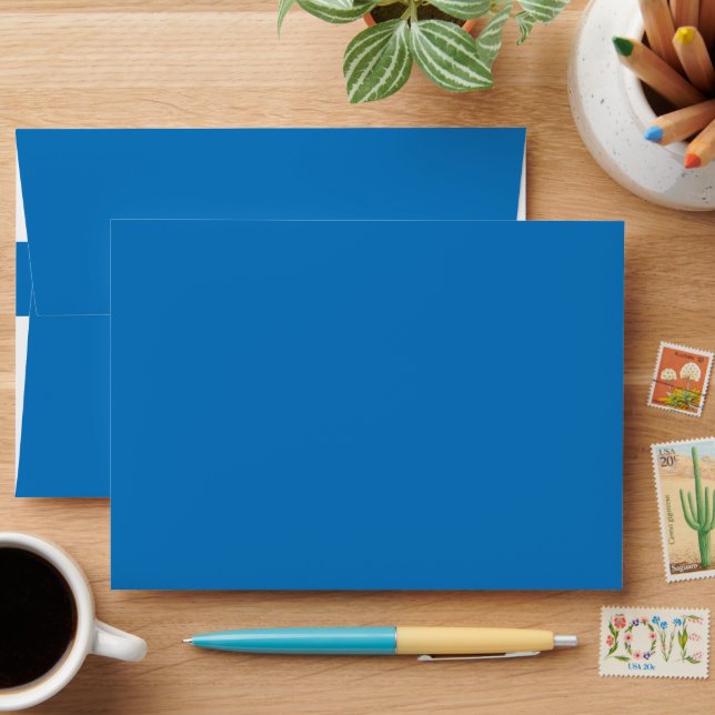 a blue background with a envelope (Desk)