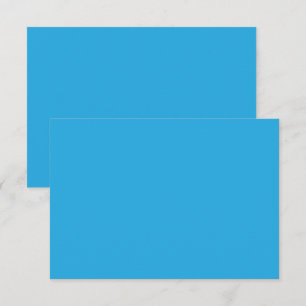 a blue background with a thank you card