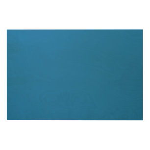 a blue background with a wood wall art