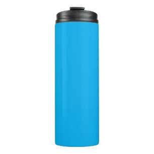 a blue sky with a plane flying in the sky thermal tumbler