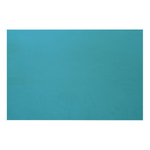 A blue square framed by a white border, presenting wood wall art