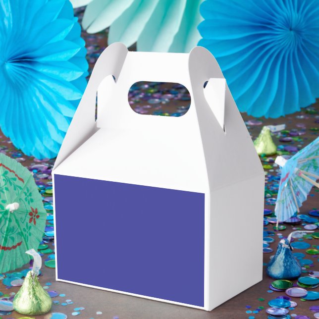 a blue wall with a clock  favor boxes (Party)