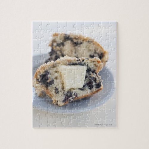A blueberry muffin with butter jigsaw puzzle