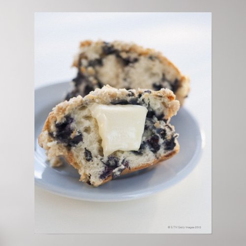 A blueberry muffin with butter poster