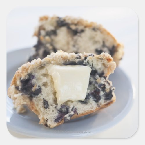 A blueberry muffin with butter square sticker