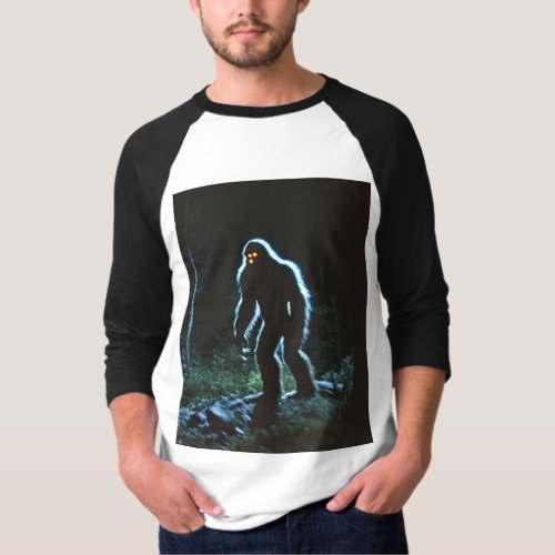 A blurred image of Bigfoot in amateur_style night T_Shirt