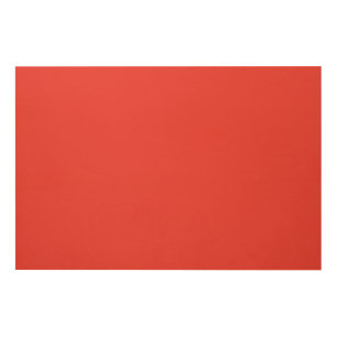 A bold red square surrounded by a crisp white bord wood wall art