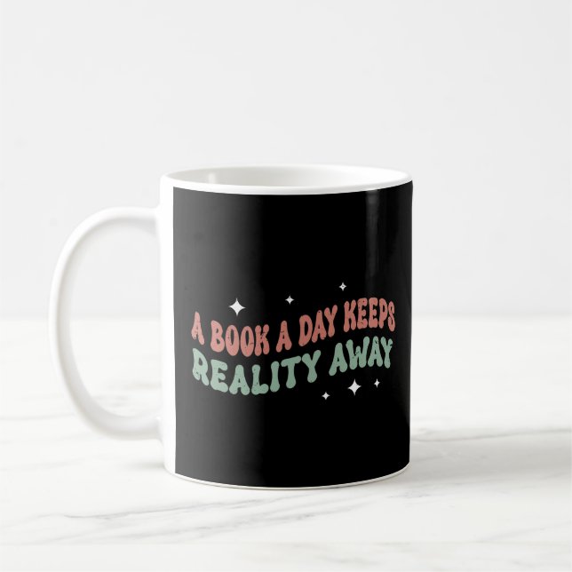A Book A Day Keeps Reality Away  Coffee Mug (Left)