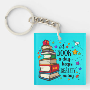 A Book A Day Keeps Reality Away Keychain