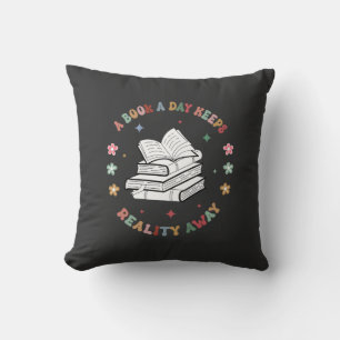 A Book A Day Keeps Reality Away Throw Pillow