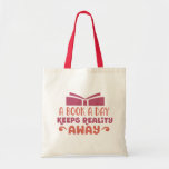 A Book a Day... Tote Bag<br><div class="desc">Great tote bag,  for any Book lover. An avid reader needs a sturdy bag to carry their books in. This book bag in natural and red tones,  features the text,  "A book a day keeps reality away."</div>