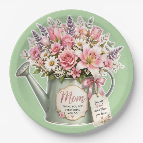 A bouquet of flowers in a watering can for mom  paper plates