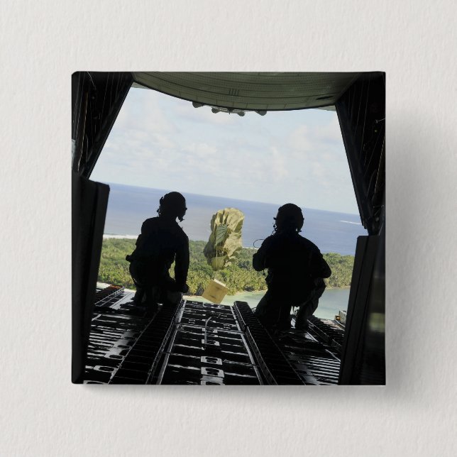 A box of humanitarian goods pinback button (Front)