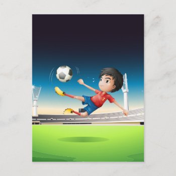 A Boy In A Red Uniform At The Soccer Field Postcard by GraphicsRF at Zazzle
