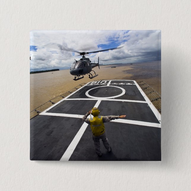 A Brazilian Eurocopter prepares to land Button (Front)