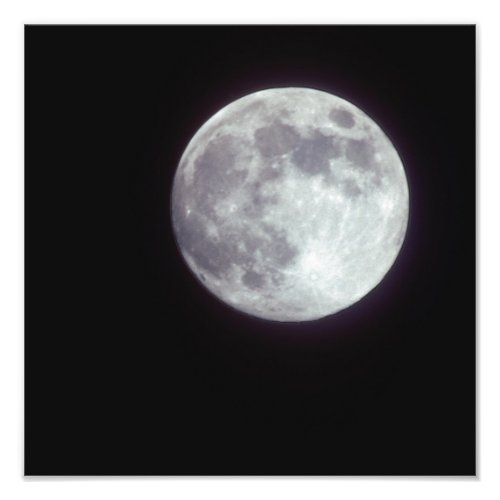 A bright full moon in a black night sky photo print