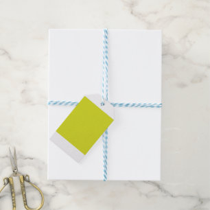 A bright yellow square with a distinct white borde gift tags