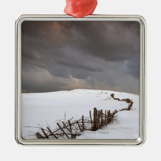 A Broken Fence Along A Snow Covered Field Metal Ornament (Front)