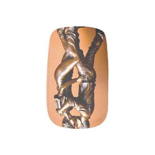 A bronze sculpture of a couple  minx nail art