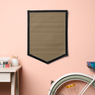a brown and beige striped background pennant