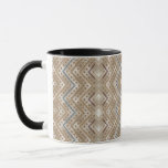 a brown and blue pattern on a white background mug