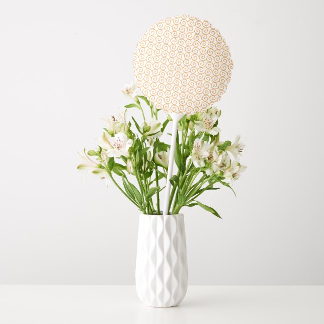 A brown and orange rug with a repeating pattern mo balloon (Vase)