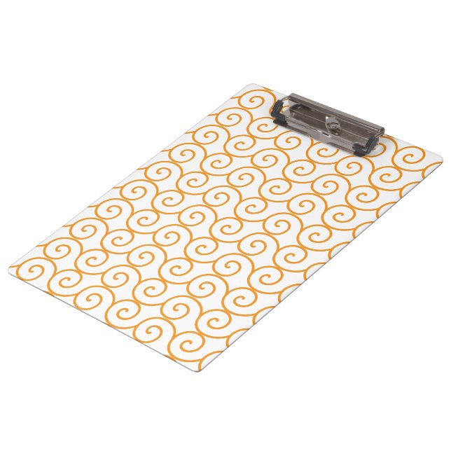 A brown and orange rug with a repeating pattern mo clipboard (Angled)