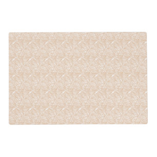A brown rug with an intricate motif lies on the fl placemat