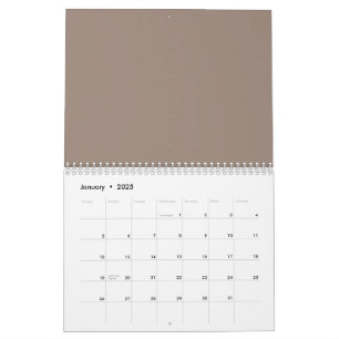 a brown wall with a clock on it calendar